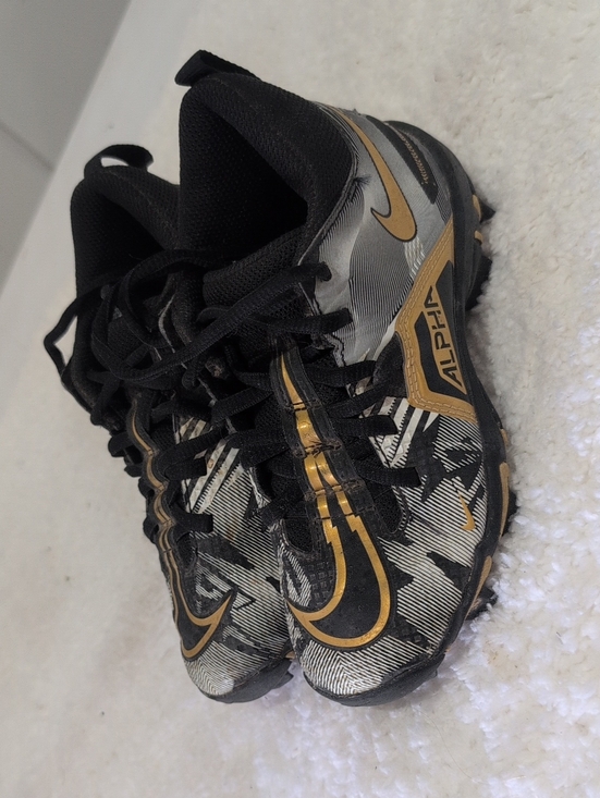 Nike Other - Nike Kids Black and Gold Alpha Turf Sneakers